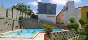 Flats no FORTE 200m praia ar piscinas portaria 24H